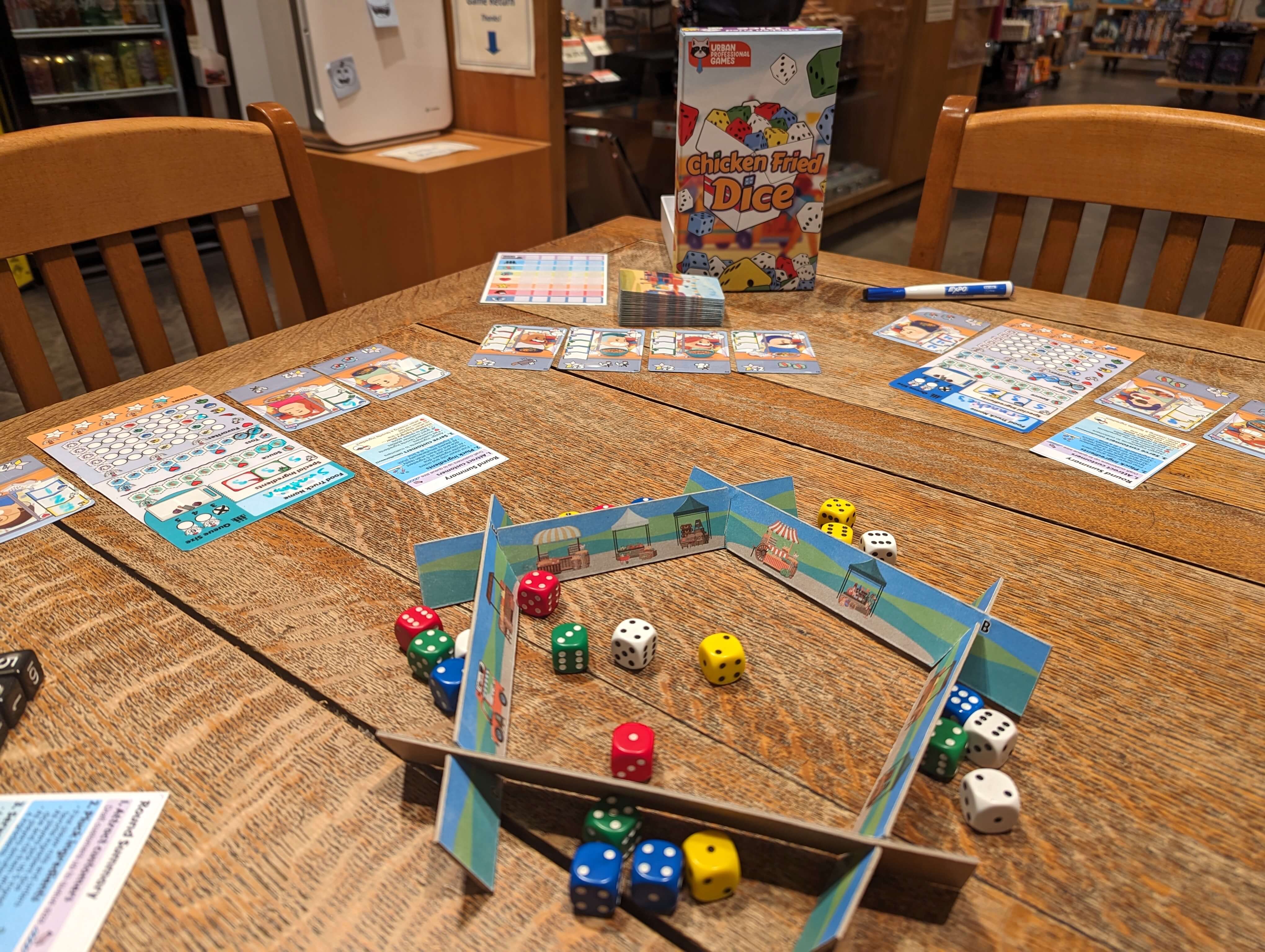 View of a game in progress where players are attracting more customers to their trucks